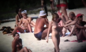 amateur-babes-get-naked-and-enjoy-the-hot-sun-on-the-beach