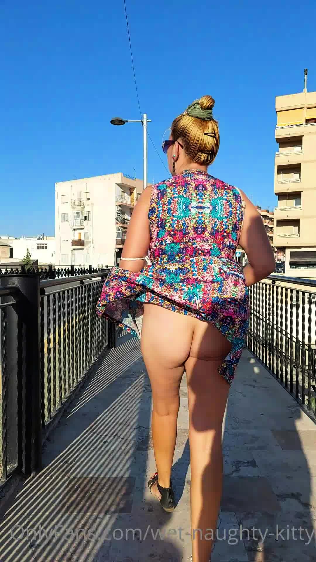 Street Voyeur Follows A Pantyless Milf With A Fabulous Ass Video at Porn picture