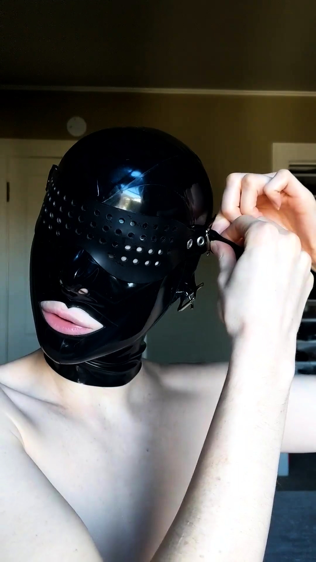 Beautiful Amateur BDSM Fetishist Trying On Latex Hood Mask Video at Porn photo image